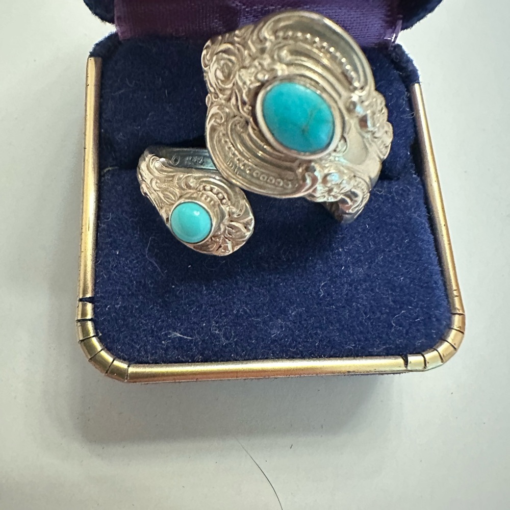 Silver and Blue Turquoise Ring with Intricate Feather Designs